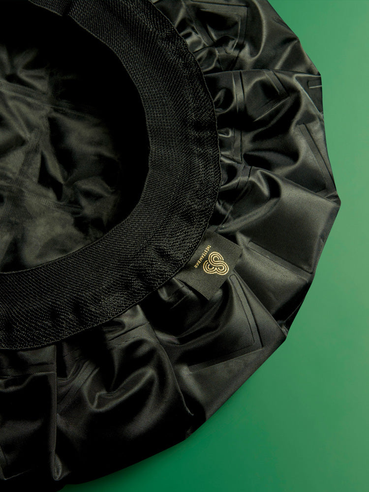 The inside of The Steam Bar's Steaming Cap showcasing the thick elastic band