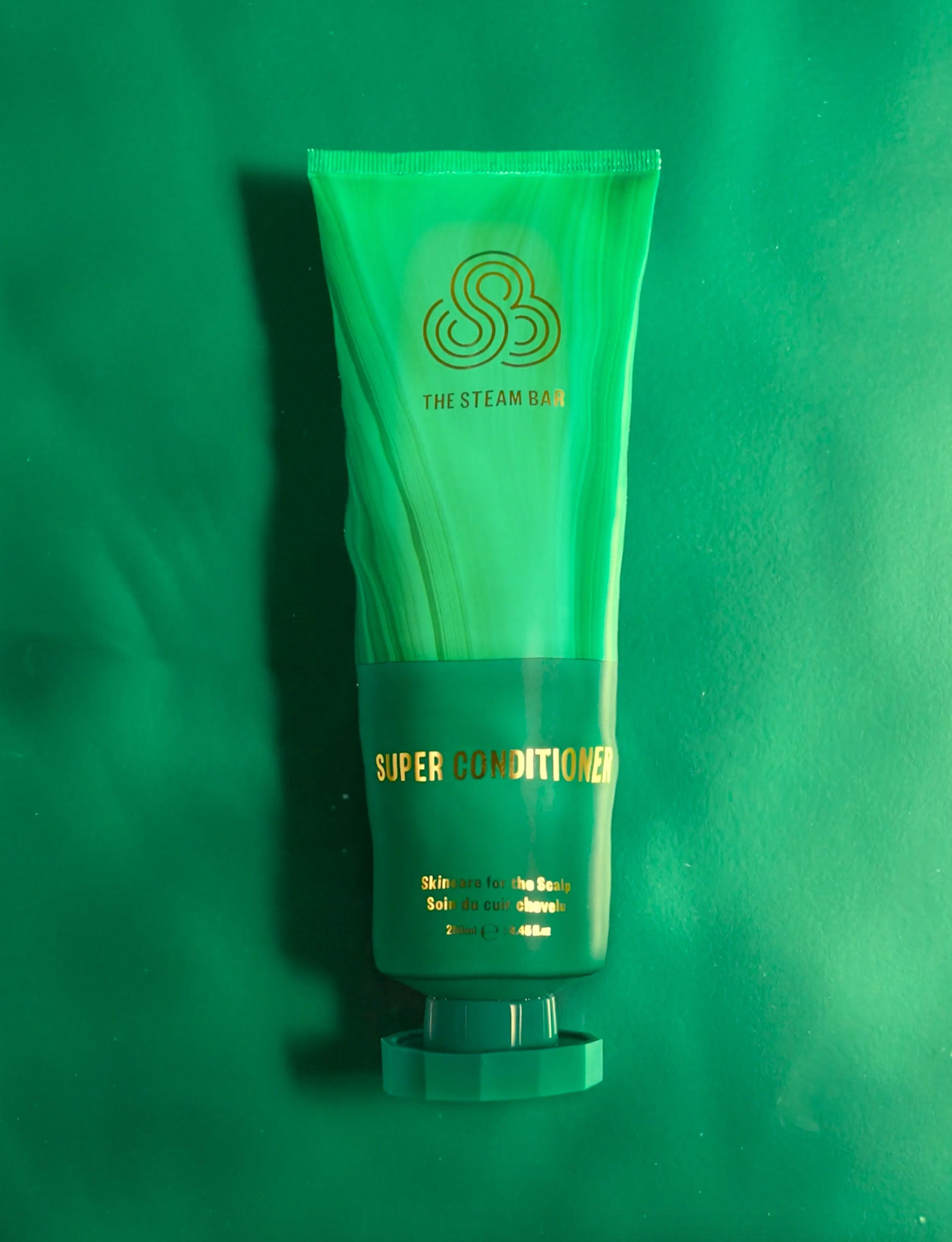 The Steam Bar's The Super Conditioner product submerged in water